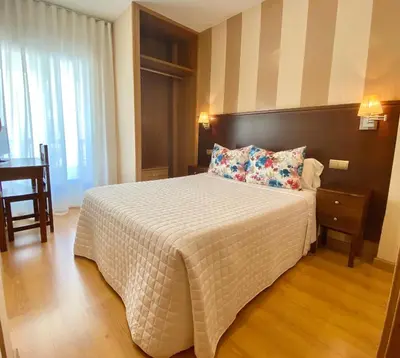 Cama o camas de una habitación en Hotel Fernando IV