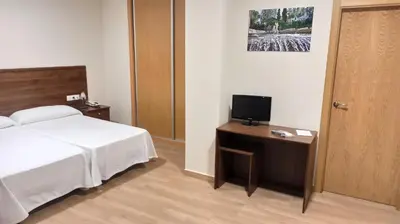 Una televisión o centro de entretenimiento en Hosteria de Rafi