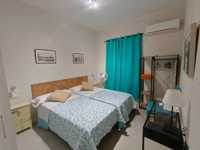 Cama o camas de una habitación en Centro de Sevilla