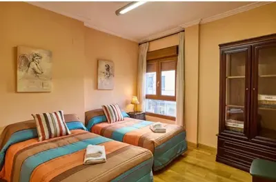 Cama o camas de una habitación en Un lugar con encanto