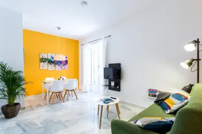 Una televisión o centro de entretenimiento en Uniko Home Sevilla