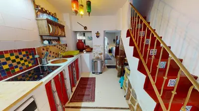 Una cocina o zona de cocina en La Nueva Andalusí