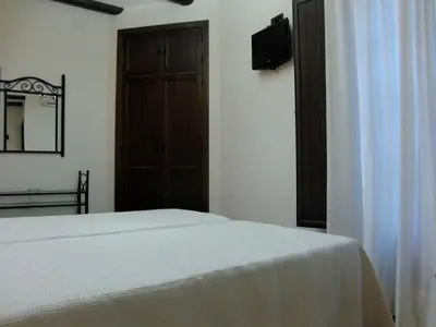 Cama o camas de una habitación en Hotel El Romeral
