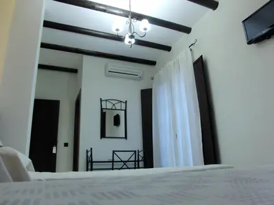 Cama o camas de una habitación en Hotel El Romeral