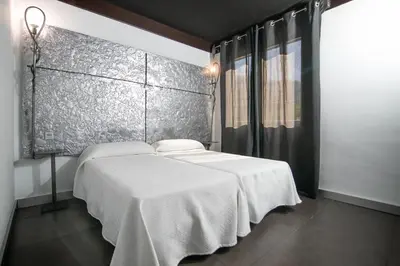 Cama o camas de una habitación en Hotel ACG