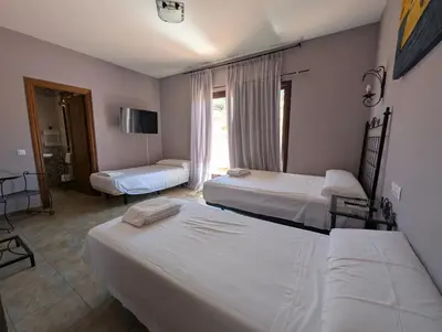 Cama o camas de una habitación en Hotel Casa Marchena