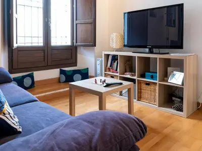 Una televisión o centro de entretenimiento en Apartamento Esparteria Parking gratuito