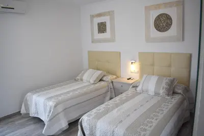 Cama o camas de una habitación en Iznájar Suites