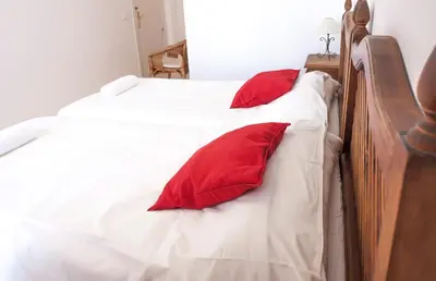 Cama o camas de una habitación en Conde Ibarra Central