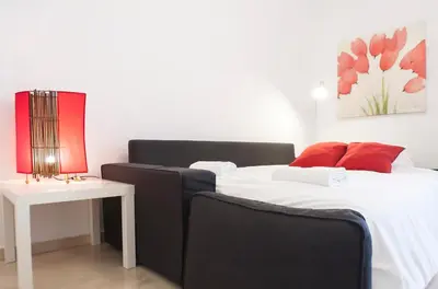 Cama o camas de una habitación en Conde Ibarra Central
