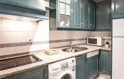 Una cocina o zona de cocina en Archeros Skyview