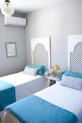 Cama o camas de una habitación en El Patio del Limonero