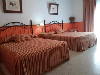Cama o camas de una habitación en Barrio Nuevo