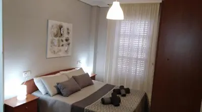Cama o camas de una habitación en Alojamiento Regina