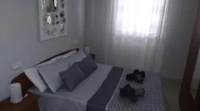 Cama o camas de una habitación en Alojamiento Regina
