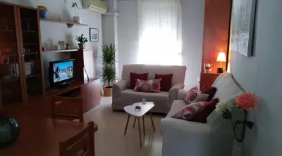 Una televisión o centro de entretenimiento en Alojamiento Regina