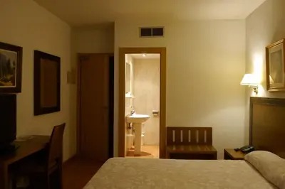 Cama o camas de una habitación en Hotel Torrezaf