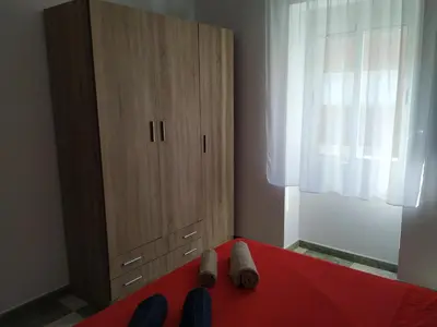 Cama o camas de una habitación en ALTILLO 25 GARAJE Y WIFI GRATIS