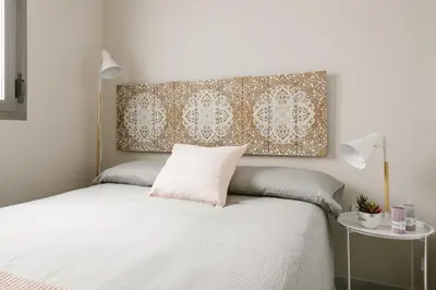 Cama o camas de una habitación en Sevilla Apartments Muro by Valcambre