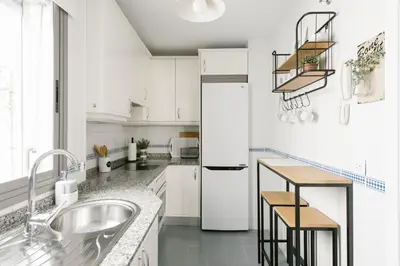Una cocina o zona de cocina en Sevilla Apartments Muro by Valcambre