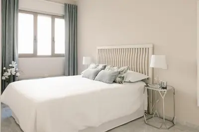 Cama o camas de una habitación en Sevilla Apartments Muro by Valcambre
