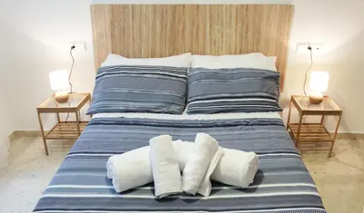 Cama o camas de una habitación en Paseos por Córdoba