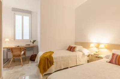 Cama o camas de una habitación en Apartamento deluxe calle Imagen