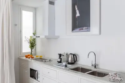 Una cocina o zona de cocina en Apartamento deluxe calle Imagen