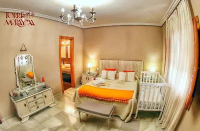 Cama o camas de una habitación en Torreón de Morayma