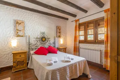 Cama o camas de una habitación en La Casa de Alejandro