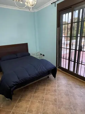 Cama o camas de una habitación en Villa en lo alto del monte