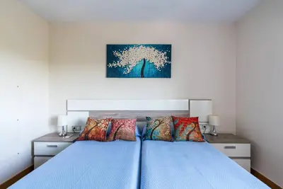 Cama o camas de una habitación en Miraflores Luxury Suites