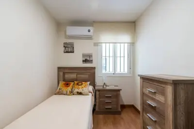 Cama o camas de una habitación en Miraflores Luxury Suites