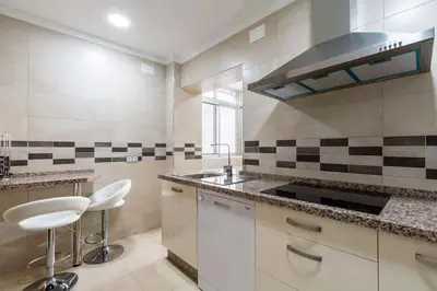 Una cocina o zona de cocina en Miraflores Luxury Suites