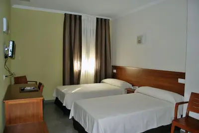Cama o camas de una habitación en Hotel Gema