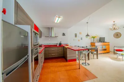 Una cocina o zona de cocina en Apartamento Turístico La Vega