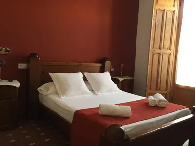 Cama o camas de una habitación en Inés Casa Rural