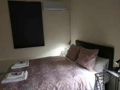 Cama o camas de una habitación en Sevilla Nervión piso con Patio