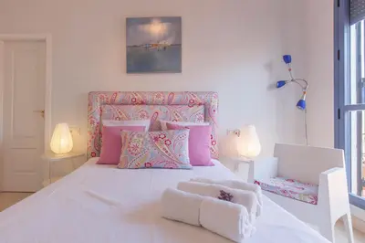 Cama o camas de una habitación en Espectacular apartamento con terraza privada parking