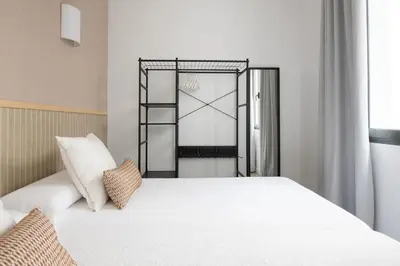 Cama o camas de una habitación en La Francesa Alameda