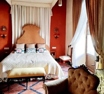 Cama o camas de una habitación en Casa Palacio Domus Astigi