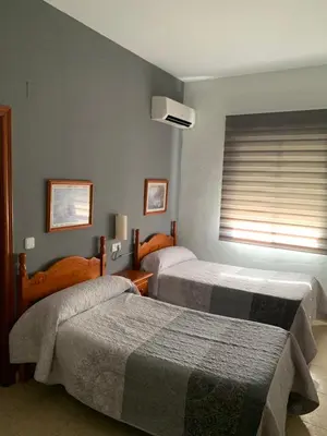 Cama o camas de una habitación en Hotel-Restaurante la Loma
