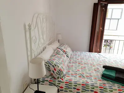 Cama o camas de una habitación en HISPALIS SAN LUIS
