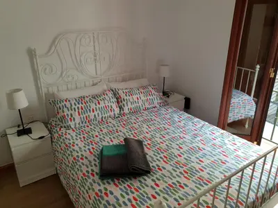 Cama o camas de una habitación en HISPALIS SAN LUIS