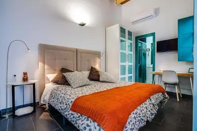 Cama o camas de una habitación en Casa Palacio El Condestable de Sevilla