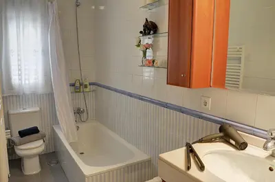 Un baño de SEVILLA BUTTERFLY SUITES