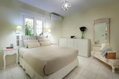 Cama o camas de una habitación en Apartamento con gran terraza jardín cerca del centro
