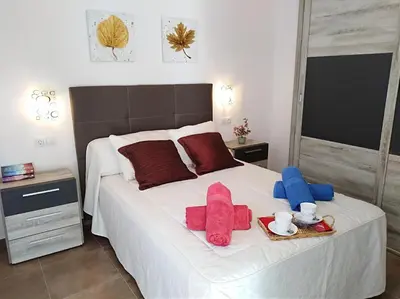 Cama o camas de una habitación en Alzahira 1