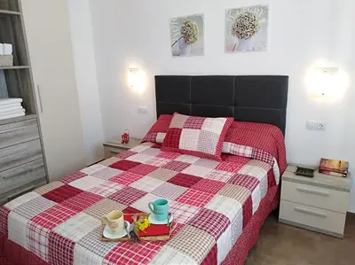 Cama o camas de una habitación en Alzahira 2