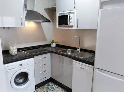 Una cocina o zona de cocina en Alzahira 2